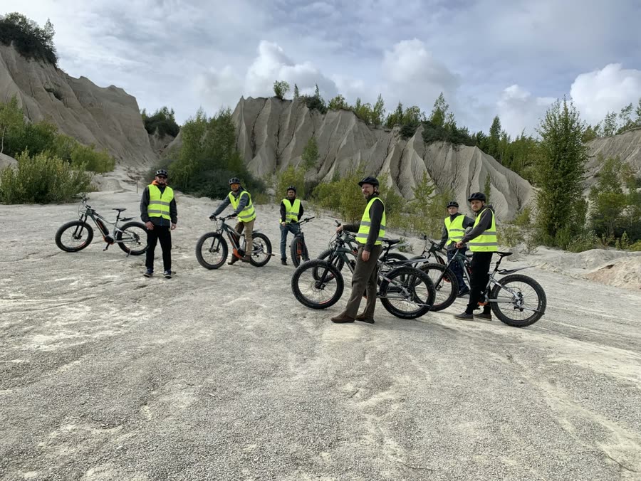 The team out on e-bikes at a quarry
